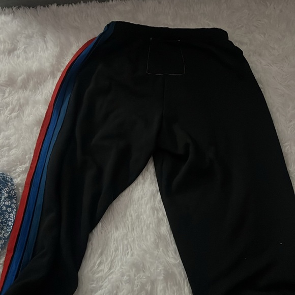 Aviator nation sweatpants. Black with orange, yellow, red and blue stripes. - Picture 3 of 3